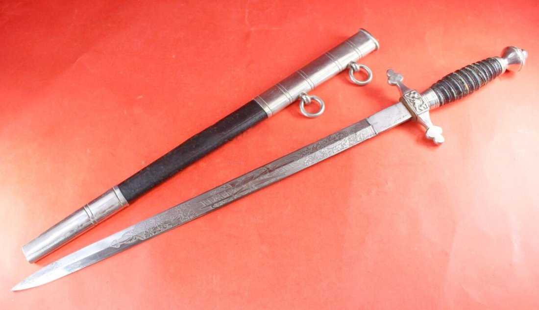 Early Pre-War German Fireman Officers dagger M1870 Pattern - Carl Eickhorn Solingen - RARE: Offered is an RARE, original, early (1921-1930) Fireman Officer′s M1870 pattern dagger with scabbard. The dagger can be dated by the early Eickhorn logo. This logo was only in use between 1921-1