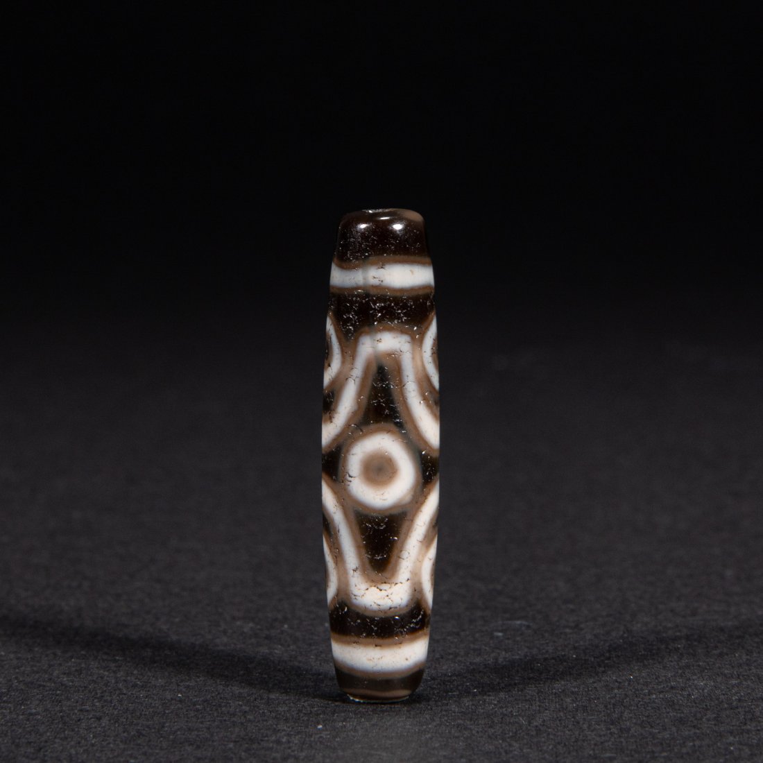 dzi: Height: 4.7cm, width: 1.2cm, weight: 9g