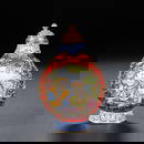 An enamel snuff bottle painted with gold fetuses in Qing Dynasty