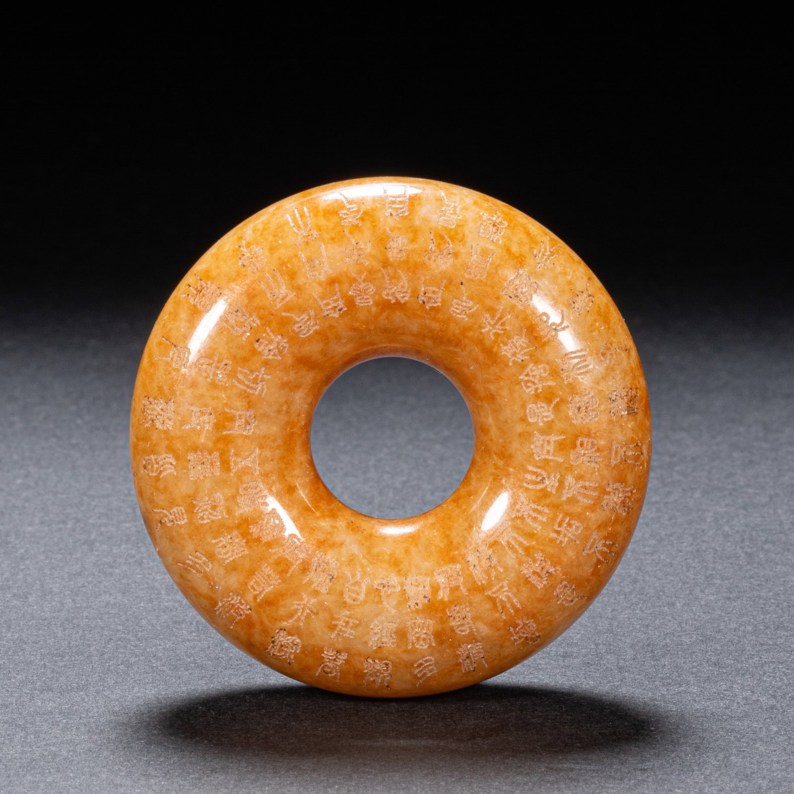Hetian jade kasaya ring: Diameter:5.5cm?Weight:75 grams