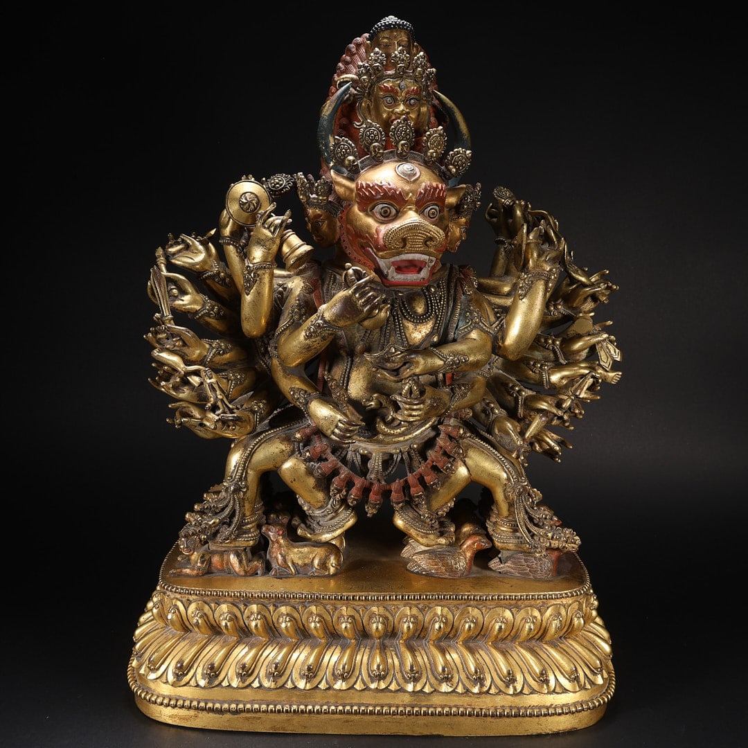 A multi-armed demon-subduing Buddha with gilded copper crowns from the Ming Dynasty (1 of 9)