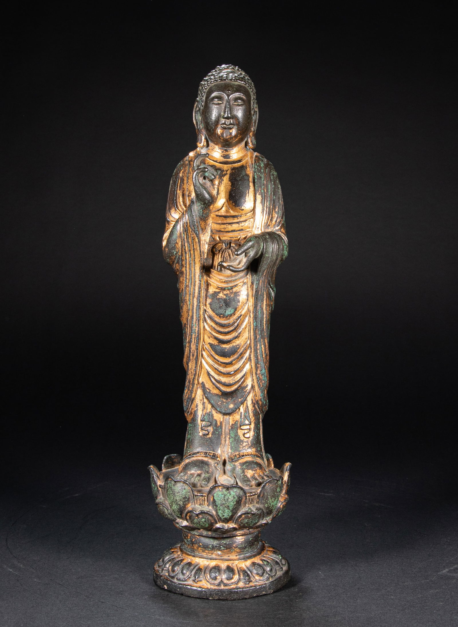A 10th-century gilded copper Buddha statue: Height?40cm, width:12cm