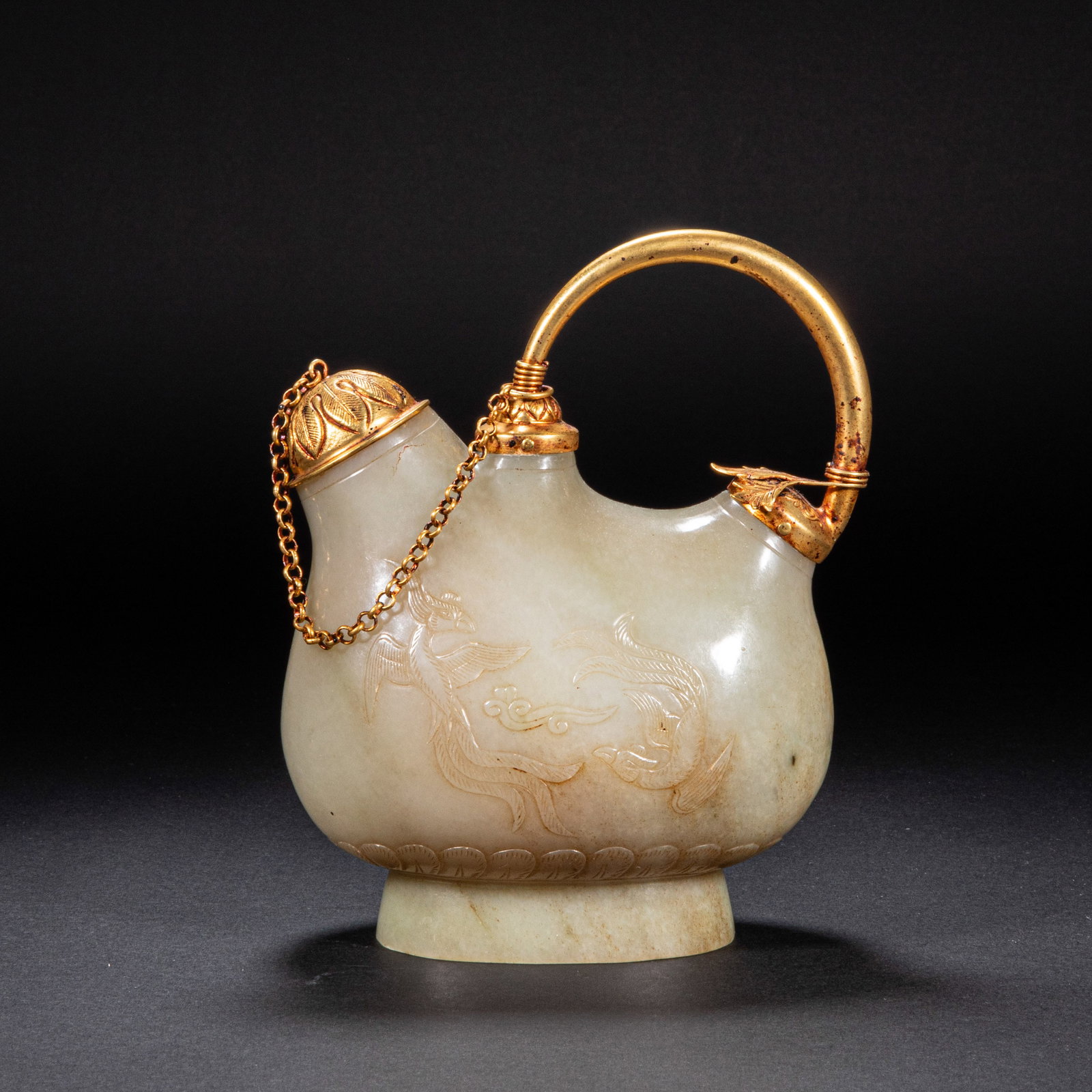A 10th-century Hetian jade gold-wrapped handle teapot: Height?18cm, width?14cm