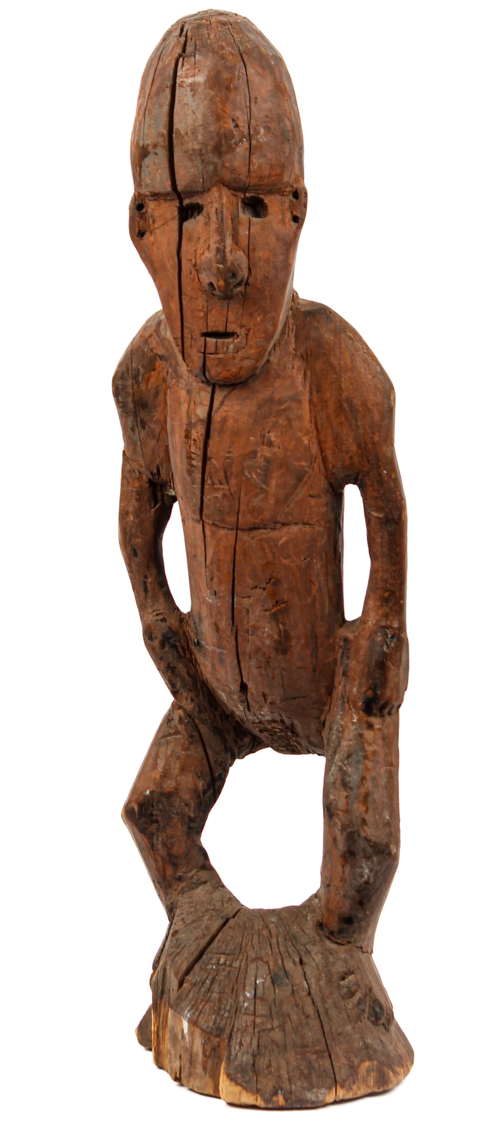 Antique African Wood Carving, Male: Type: Carving / sculpture Materials: Wood Markings & Inscriptions: Unmarked Date: Early 20th century Maker: African Description: An African carving of a male, of unknown origin, likely from a shrine.