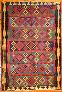 Turkish Kilim Rug: Type: Rug Materials: Dyed wool Markings & Inscriptions: Unmarked Date: Early to mid 20th century Maker: Turkish Description: A vintage Turkish Kilim flat weave rug with colorful geometric