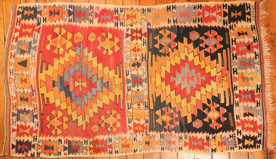 Turkish Kilim Rug: Type: Rug Materials: Dyed wool Markings & Inscriptions: Unmarked Date: Early to mid 20th century Maker: TurkishBr> Description: A colorful Turkish Kilin flat weave rug with geometric patterned designs