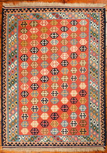 Turkish Kilim Rug: Type: Rug Materials: Dyed wool Markings & Inscriptions: Unmarked Date: Mid 20th century Maker: Turkish Description: A colorful Kilim flat weave rug decorated with tribal & geometric motifs,