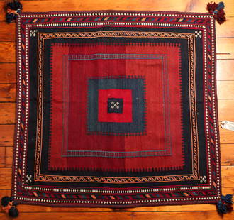 Turkish Sofreh Kilim Rug: Type: Rug Materials: Dyed wool Markings & Inscriptions: Unmarked Date: Early to mid 20th century Maker: Turkish Description: A Sofreh Kilim rug with geometric decoration and corner tassels.