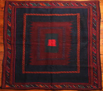 Turkish Sofreh Kilim Rug: Type: Rug Materials: Dyed wool Markings & Inscriptions: Unmarked Date: Early to mid 20th century Maker: Turkish Description: A Sofreh Kilim rug with geometric decoration within several square