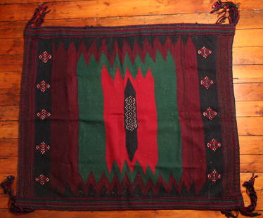 Turkish Sofreh Kilim Rug: Type: Rug Materials: Dyed wool Markings & Inscriptions: Unmarked Date: Early to mid 20th century Maker: Turkish Description: A Sofreh Kilim rug with geometric decoration and corner tassels.