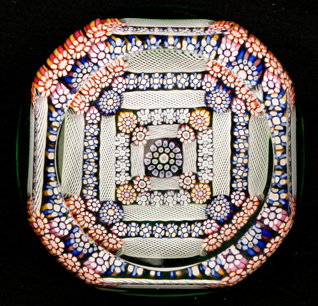 Perthshire Glass Paperweight: Type: Paperweight Materials: Glass Markings & Inscriptions: Marked and labeled Date: 2000 Maker: Perthshire Paperweights Description: A faceted paperweight with alternating millefiori and latticino in