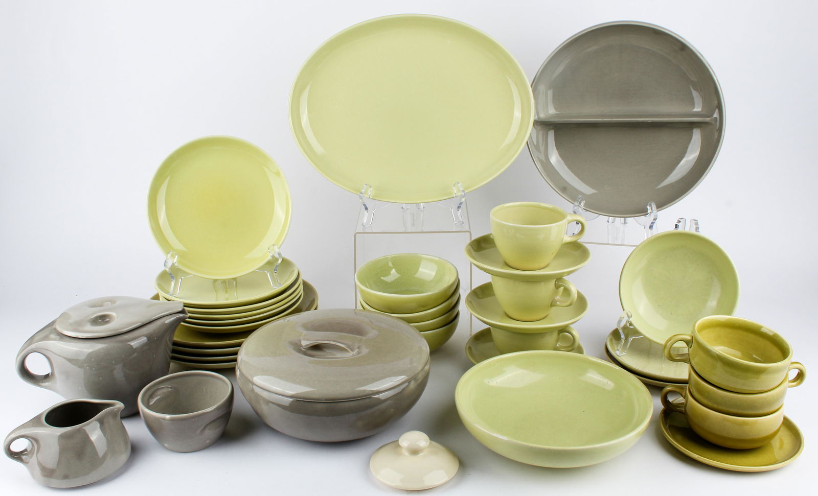 Russel Wright for Iroquois China: Type: Dinnerware Materials: Ceramic Markings & Inscriptions: Most marked Date: Mid 20th century Maker: Iroquois China Description: Dimensions: Thirty-four pieces, including one gray cream and sugar,