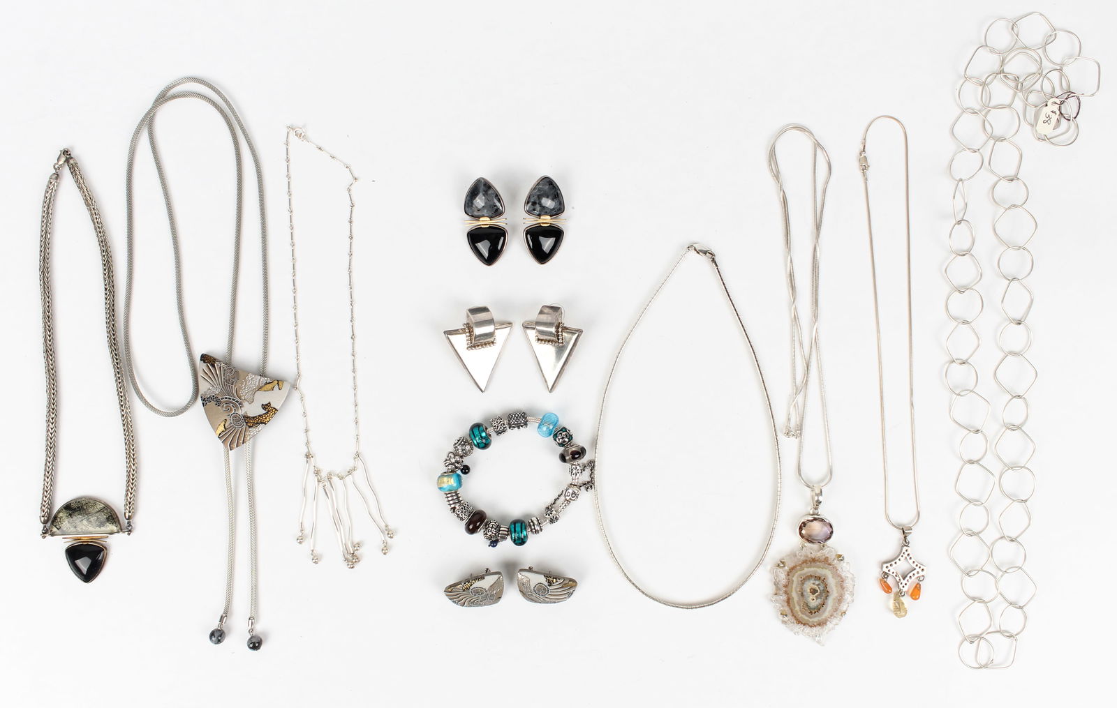 Seven Necklaces, Three Pairs of Earrings and a Pandora Bracelet (1 of 8)