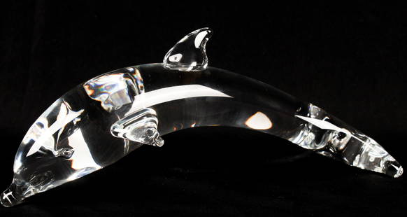 Steuben Glass Dolphin Sculpture: Description: A Steuben glass dolphin sculpture, signed on the underside of the tail. Type: Sculpture Materials: Glass  Markings & Inscriptions: Signed  Date: Late 20th century / contemporary Maker: St