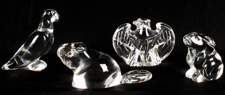 Steuben, Baccarat Art Glass Sculptures: Description: An estate collection of four glass & crystal sculptures to include: a Baccarat parrot, a Baccarat rabbit, a Steuben beaver and a Steuben Lloyd Atkins designed eagle. Type: Sculpture Mater