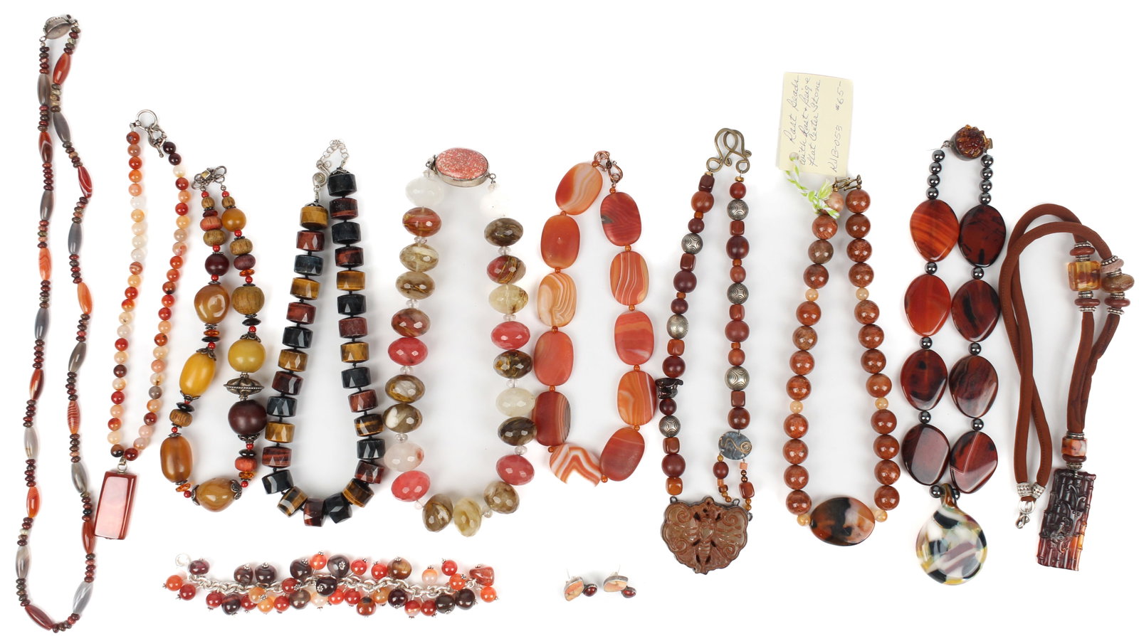 Ten Necklaces, a Bracelet and Earrings with Semi-Precious Stones and Silver: Description: An assortment of ten artisan necklaces, a bracelet and earrings, including by Sojourner & Brooke Jaron, in semi-precious stones and silver. Type: Necklace, bracelet, pierced earrings Mate