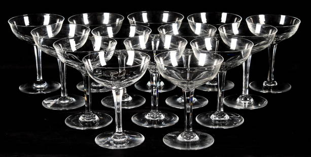 Fourteen Baccarat Crystal Zurich Champagne Coupes: Description: Fourteen Baccarat crystal champagne coupes in the Zurich pattern.Type: Champagne coupe, stemMaterials: Crystal / glassMarkings & Inscriptions: MarkedDate: Mid to late 20th century Maker: