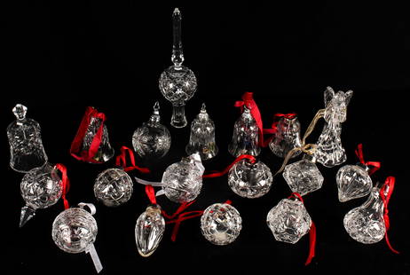 Nineteen Waterford Crystal Christmas Tree Ball Ornaments, Figures, Bells and Tree Topper: Description: An estate group of nineteen Waterford Crystal Christmas tree ball ornaments, angel figure, tree topper and bells. Seven with original boxes.Type: Ornaments and decorationsMaterials: Cryst