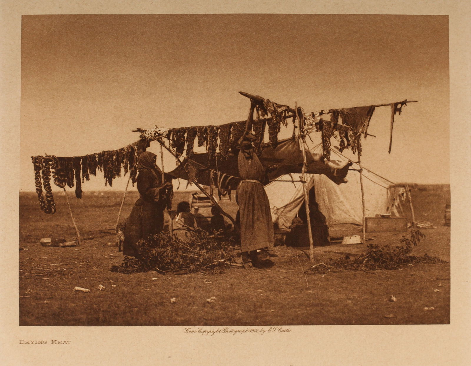 Edward S. Curtis (American, (1868-1952) Photogravure "Drying Meat" 1908 (1 of 4)