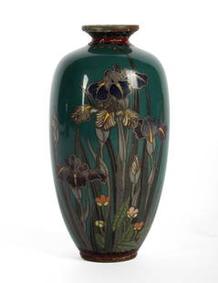 Japanese Meiji Cloisonne Iris Cabinet Vase: Description: A Japanese Meiji period cloisonne cabinet vase decorated with irises on a teal or blue-green ground.Type: VaseMaterials: Bronze, glassMarkings & Inscriptions: Marked on the underside Date