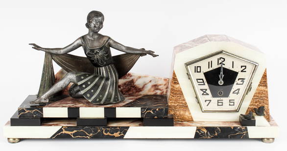 Large Art Deco Figural Marble Mantel Clock: Description: An Art Deco period figural marble mantel clock decorated with a spelter female figure seated on a raised platform looking at two birds Type: Mantel clockMaterials: Marble, spelter, metalM