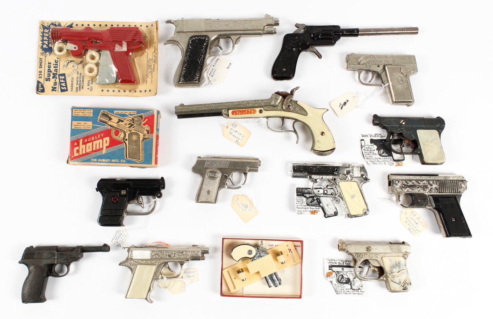 Vintage Toy Cap Guns Incl. Hubley, Kilgore, Stevens: Description: A group of vintage cap guns by various makers including Hubley, Stevens, and Kilgore. Type: Toy gun Materials: Metal, plastic Markings & Inscriptions: Marked Date: Mid 20th century Maker:
