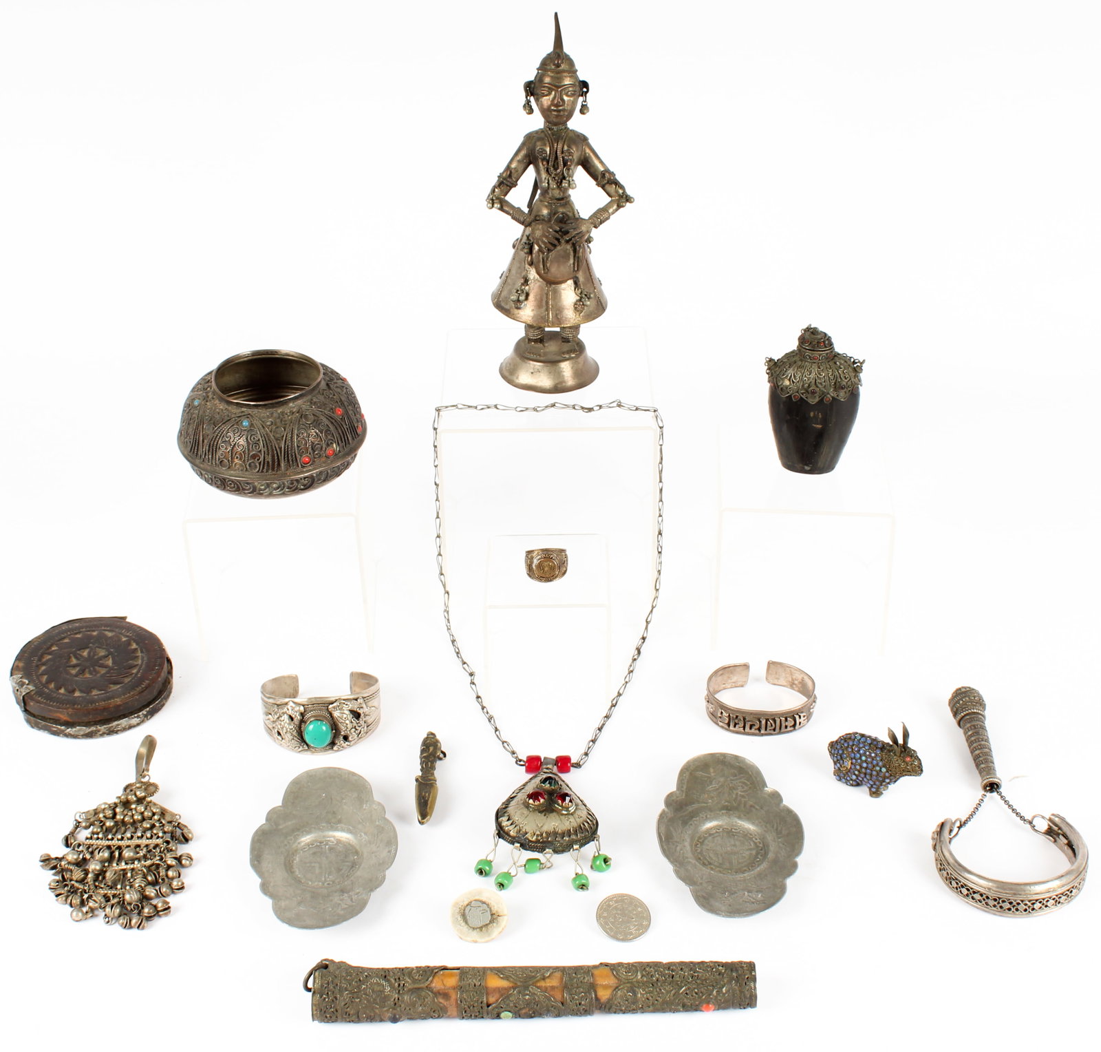Tibetan, Asian, and African Metal Objects: Description: To include a bronze Phurba pendant, two Chinese oblong engraved pewter dishes, a horn snuff bottle with jewelled metal top, a silver plated bowl with inlaid beads and wire surface decorat