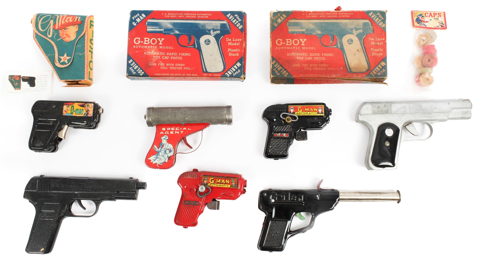 Vintage G-Man & FBI Toy guns Incl. Inque Japan, Linemar, Acme: Description: Seven vintage toy guns and boxes to include: an Occupied Japan INQUE sparkling flashing pistol with box, two Linemar Co wind-up pistols, an Acme Novelty G-Boy cap pistol and box with an u