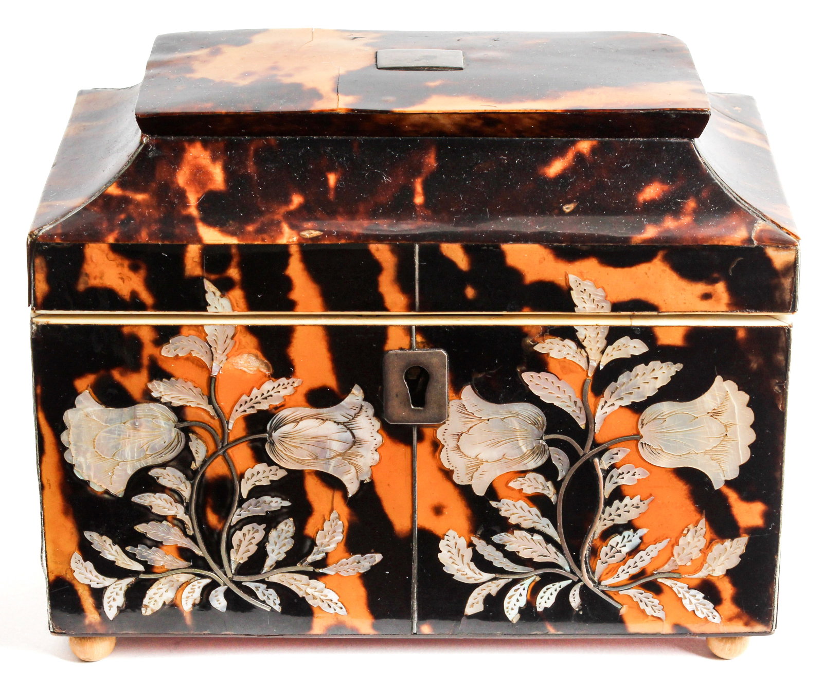 Antique English Georgian Mother of Pearl Inlaid Tortoise Shell Tea Caddy, Mid 19th Century: Description: An English tortoise shell tea caddy in rectangular form having a stepped sarcophagus lid bearing a centered silver plaque with likely worn script. The body being inlaid with mother-of-pea