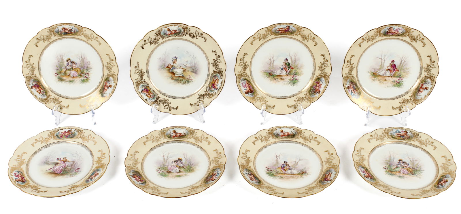 Bernardaud Limoges France Porcelain Cabinet Plates, Courting Scenes: Description: A group of 8 antique R. DeLinieres / Bernardaud Limoges hand embellished and gilt decorated porcelain plates. Each plate depicting various garden, meadow, and courting scenes, and surroun