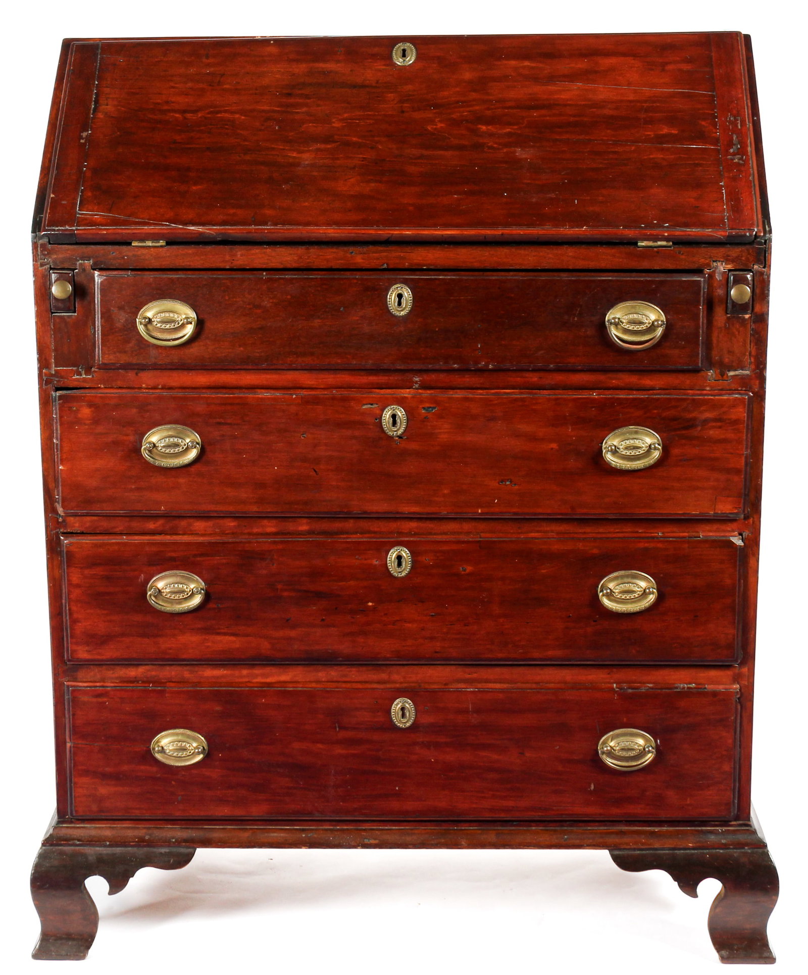 Pennsylvania Walnut Slant Front Desk Ca. 1780: Description: A late 18th century example having a dovetailed case, the lid opoening to reveal four drawers above six valanced pigeon holes, above four graduated dovetailed drawers and ogee bracket fee
