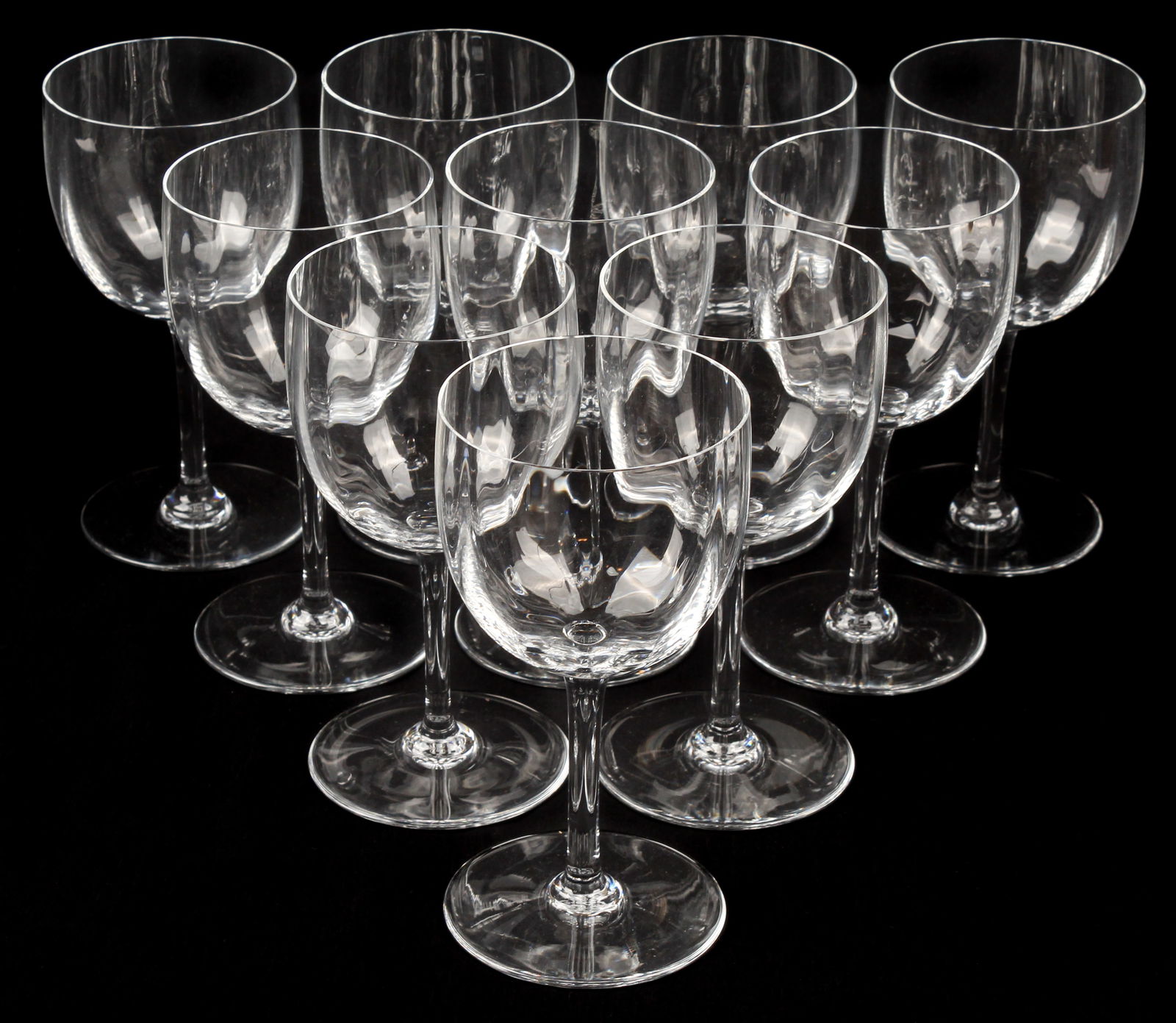 Ten Baccarat Montaigne Optic Tall Water Goblets / Glasses: Description: A group of ten Baccarat Montaigne Optic pattern tall water goblets.Materials: Glass, crystalMarkings & Inscriptions: Marked Date: Late 20th century Maker: Baccarat Dimensions: 7" H.Proven