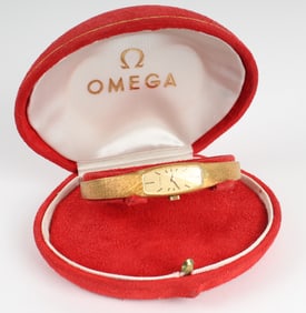 An 18k Gold Ladies Omega Swiss Made Watch