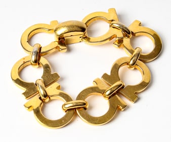 A Salvatore Ferragamo Gold Tone Gancini Bracelet