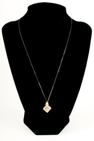 10K Yellow Gold Diamond Pendant with 14K Yellow Gold Chain