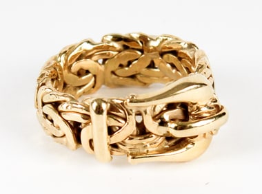 An 18k Gold Buckle Ring