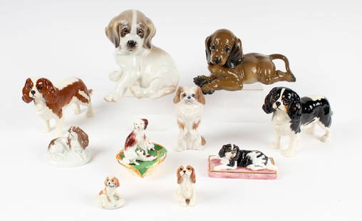Ten Porcelain Dog Figures, Royal Copenhagen, Beswick, Miranda Smith Etc.: Description: A group of 10 porcelain dog figurines consisting of: three Beswick England porcelain figures (two larger), a large Nymphenburg Western Germany porcelain St. Bernard seated puppy which is