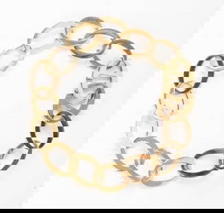 An 18K Gold Link Bracelet Made In Germany: Description: An 18k gold link bracelet made in Germany. Markings & Inscriptions: 750, GermanyDate: 20th/21st centuryMaker: GermanDimensions: 7.25" L, 9.7g total weight.Provenance: From a West Chester,