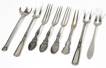 Group of Eight Sterling Silver Serving Forks