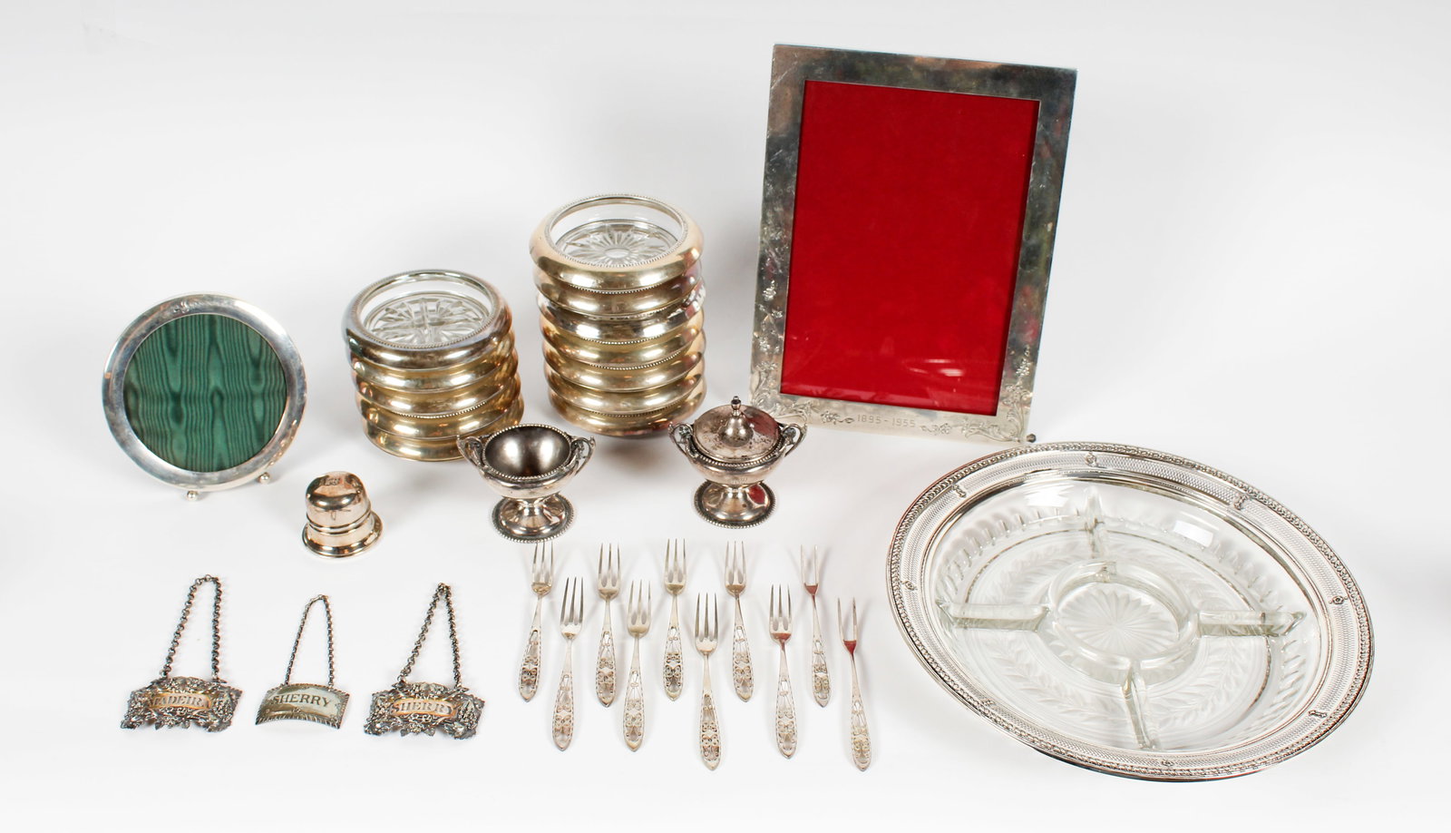 Charles Rawlings Silver Wine Labels, Etc.: Description: To include two Charles Rawlings sterling wine labels/bottle tags, a Williamsburg Reproduction sterling wine label/bottle tag by Stieff, a set of nine .800 silver cocktail forks, twelve st