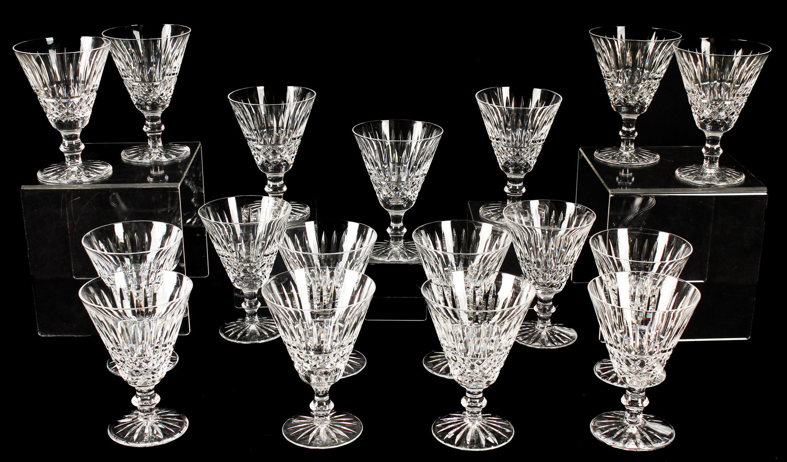 Seventeen Waterford Crystal Tramore Water Goblets: Description: A group of seventeen cut water goblets in the Tramore pattern. Markings & Inscriptions: Marked Date: Late 20th centuryMaker: Waterford Dimensions: 5 5/8" H Provenance: From a Devon, Penns