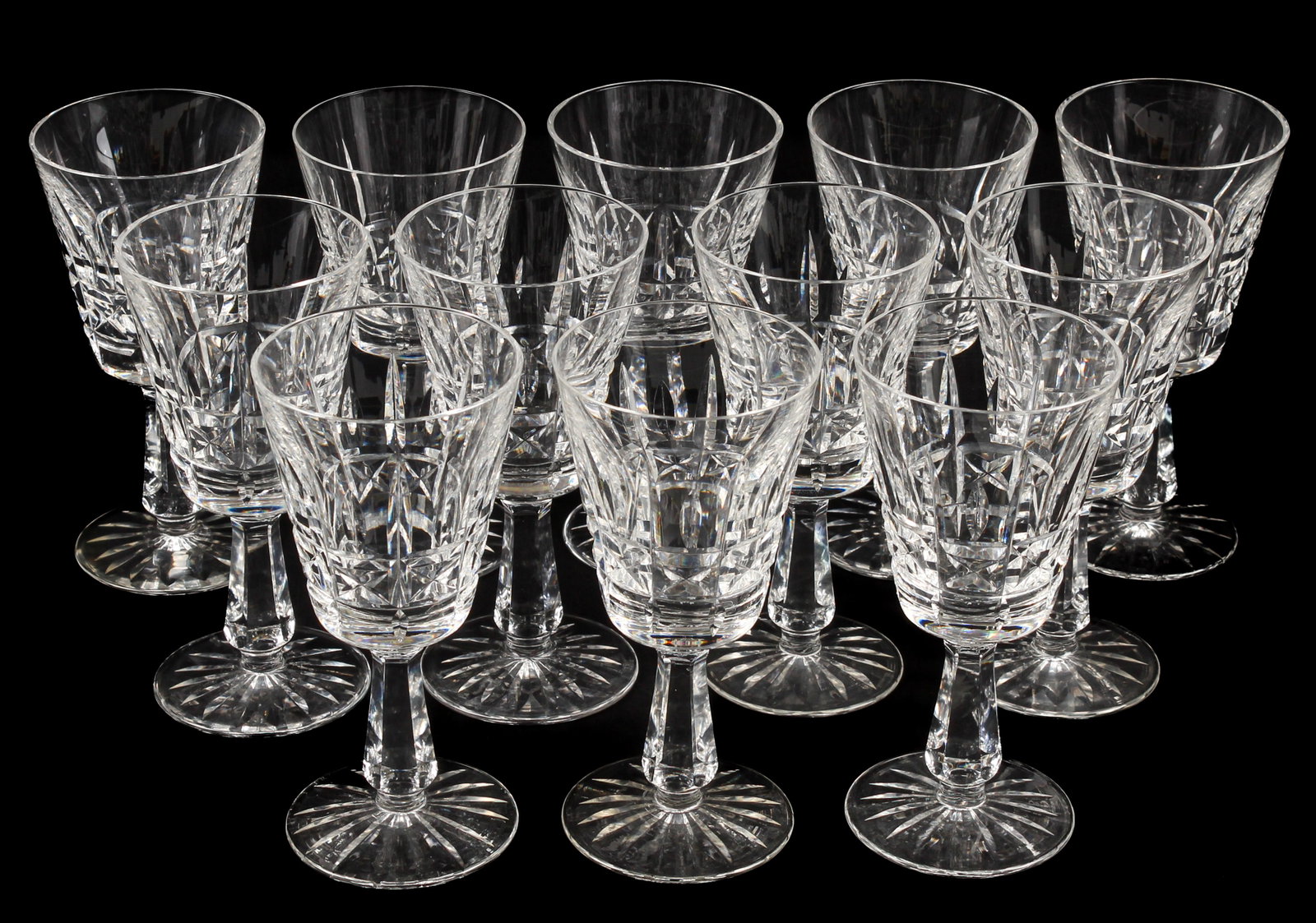 Twelve Waterford Kylemore Crystal Claret Glasses: Description: A group of 12 Waterford Kylemore pattern crystal claret / red wine glasses Materials: Crystal, glass Markings & Inscriptions: Marked Date: Late 20th century Maker: Waterford Dimensions: 6