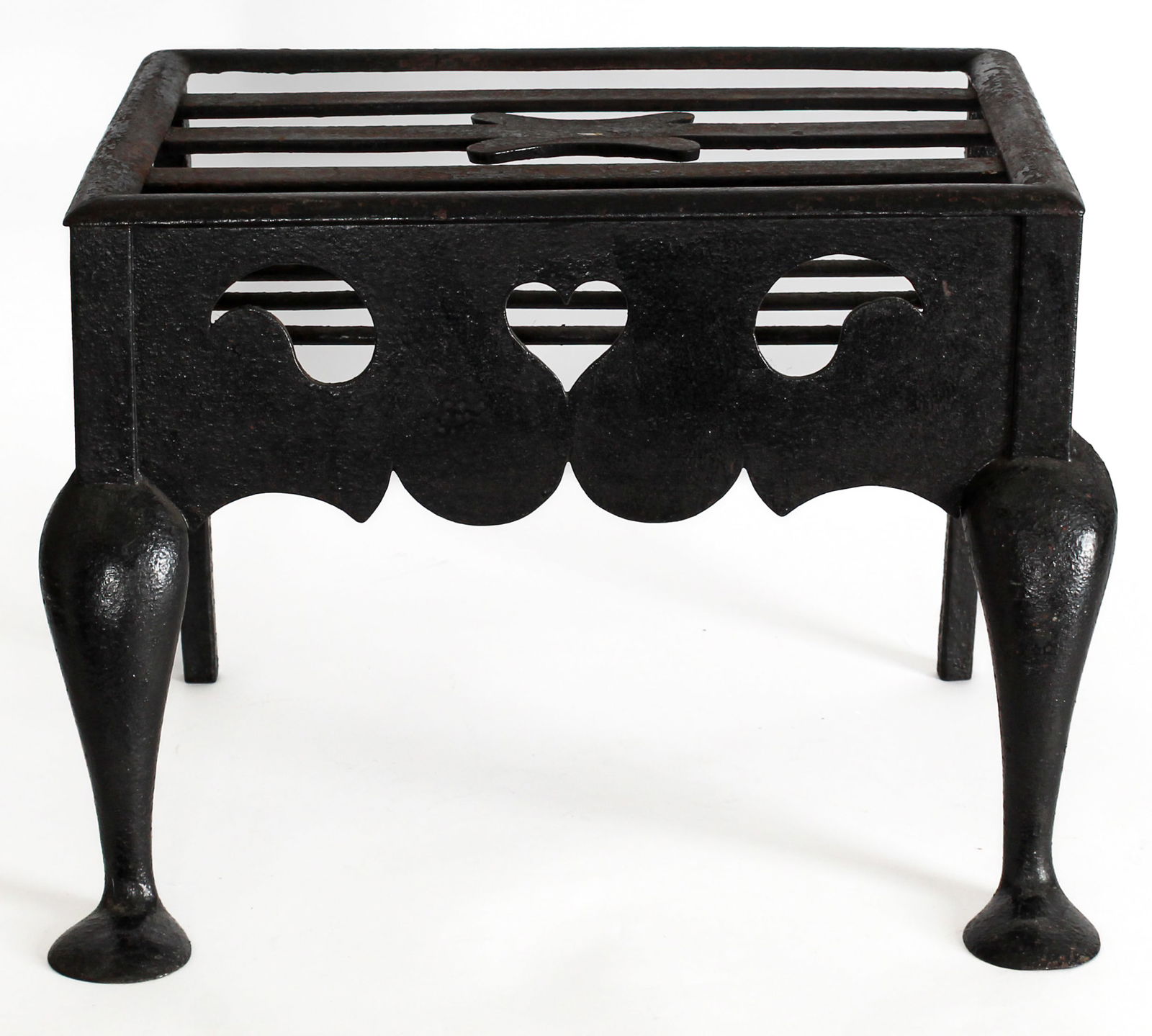 Early 19th C. Wrought Iron Footman, Heart Motif: Description: An antique wrought iron footman with pierced skirt decorated with a heart motif, cabriole legs, and pad feet. Markings & Inscriptions: Unmarked Date: Early 19th centuryMaker: American or
