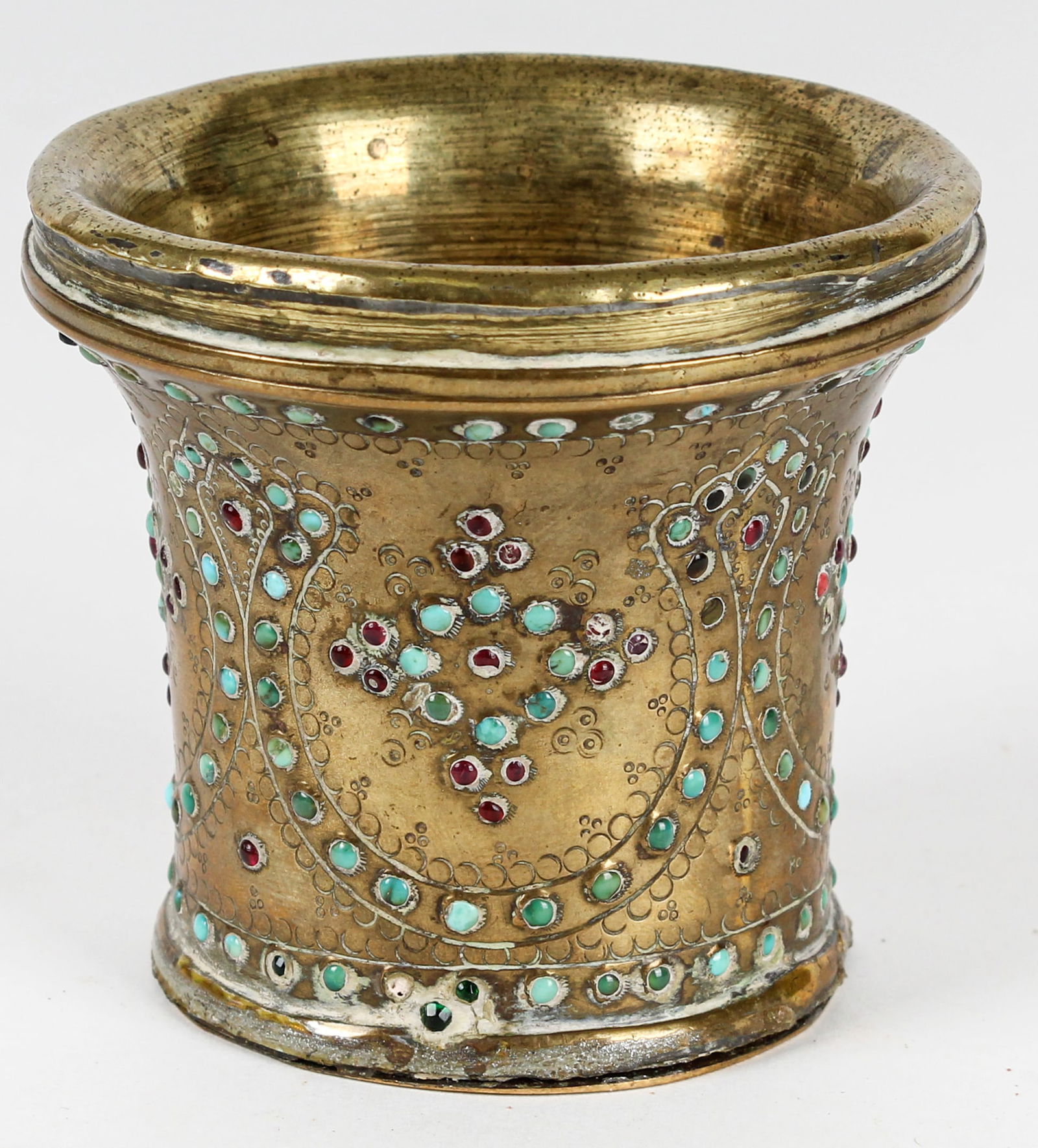 19th Century Qajar Turquoise and Garnet Inlaid Hookah Pipe Cup: Description: A brass example inlaid with semi-precious stones. Markings & Inscriptions: Unmarked Date: Mid to late 19th centuryMaker: Persian/Iranian Dimensions: 2.75" x 3".Provenance: From a Glenside