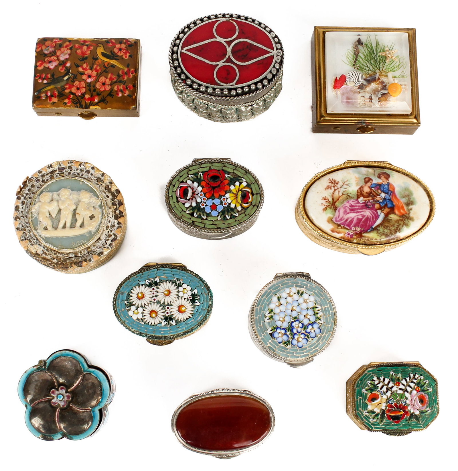 Group of Eleven Pill Boxes, Enameled, Porcelain: Description: A group of eleven various pill boxes. Including four silver metal boxes, one Chinese or Japanese, another with a cabochon stone top, the third a round silver metal box with a resin Wedgwo