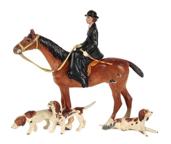 Austrian Cold-Painted Bronze Miniature of a Female Foxhunter and Three Hounds