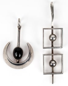 Two N.E. From Sterling Silver Pendants