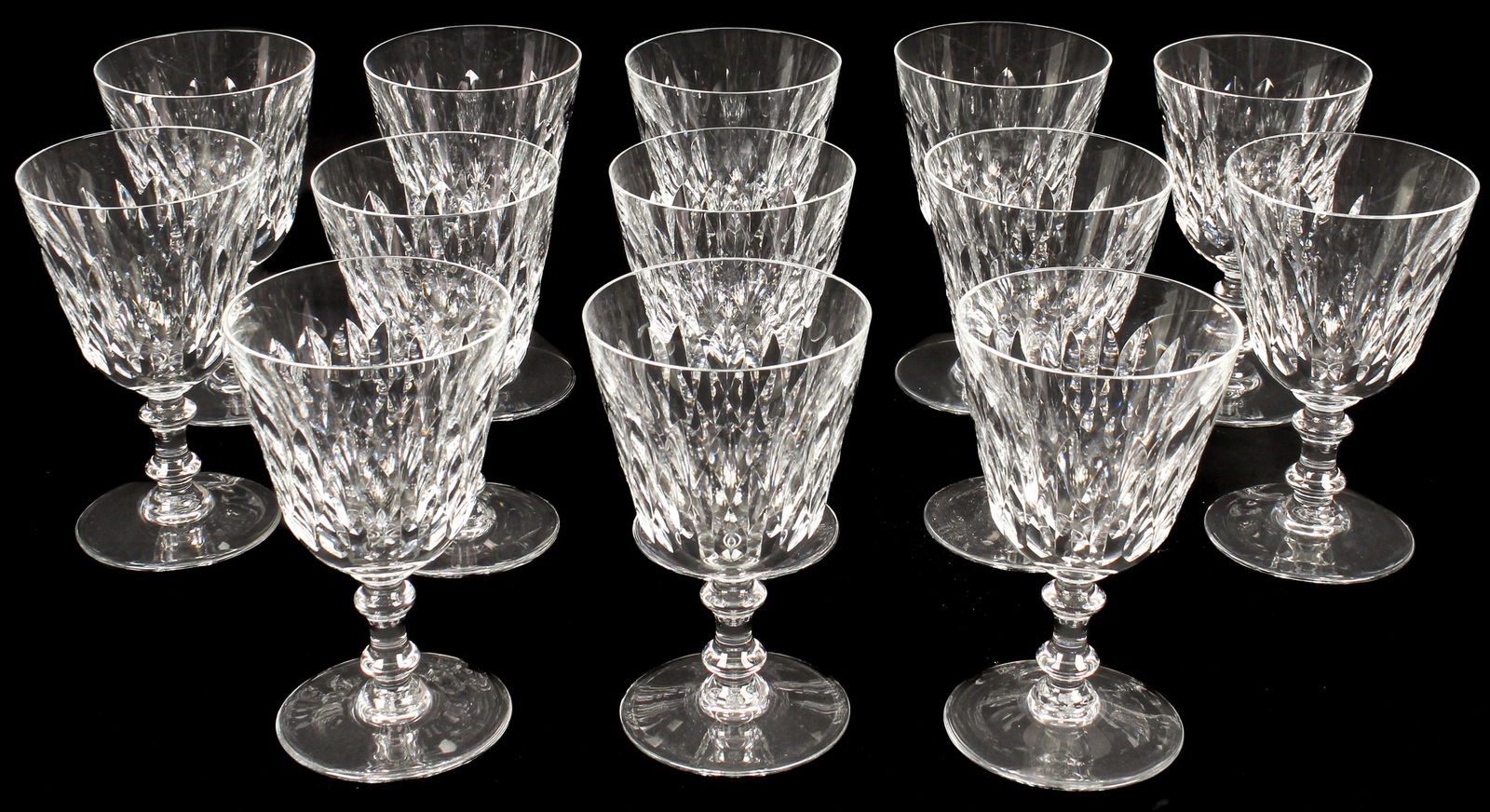 Thirteen Baccarat Crystal Armagnac Water Goblets: Description: A set of thirteen Baccarat crystal Armagnac water goblets, made in France. Markings & Inscriptions: Marked on baseDate: 20th century Maker: BaccaratDimensions: 5.5" x 3.75". Provenance: F
