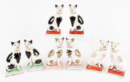Eight Late 19th Century Staffordshire Seated Cat Figures