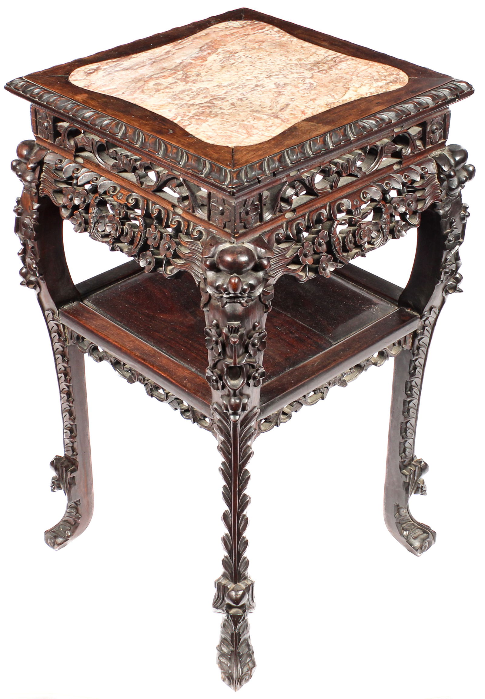 Antique Chinese Carved Hardwood and Marble Top Stand: Description: An antique Chinese lacquered hardwood and rouge marble top stand, featuring intricately carved reticulated floral carvings along apron, floral motifs along cabriole legs, an inset shelf,